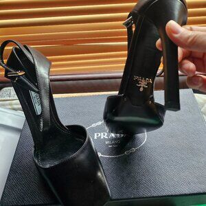 Prada Black Leather Platform Slingback Pumps with Gold Logo